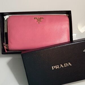 Prada Pink Zip-Around Saffiano Leather Wallet
COA card included